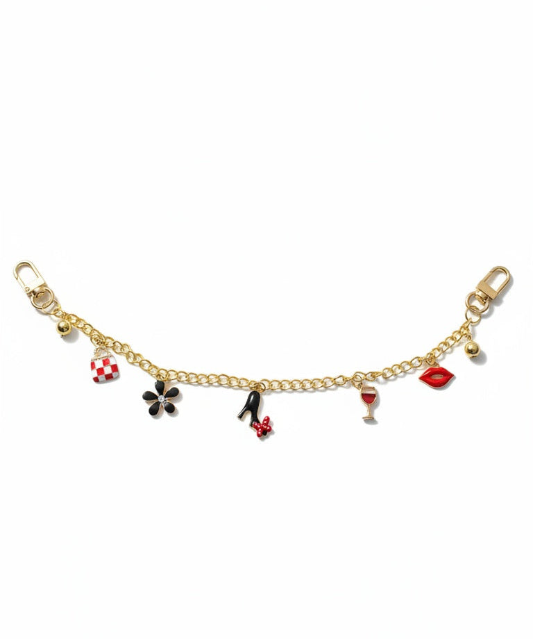 Gold  with various charms on a white background