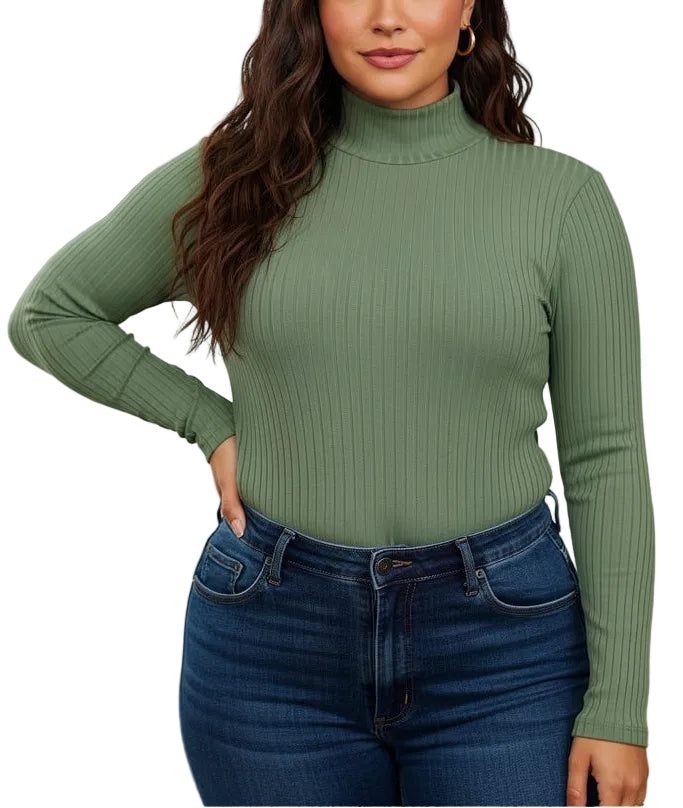 Woman wearing a green ribbed turtleneck body suit and blue jeans on a white background